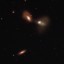 Interacting Galaxies with an Onlooker